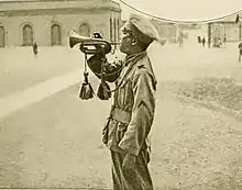 Old newspaper clipping of Asian soldiers
