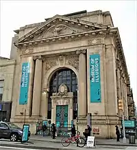 The front facade with banners for the Museum of Illusions (2020)