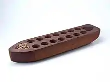 Image 4Sungka, a traditional Filipino game. (from Culture of the Philippines)