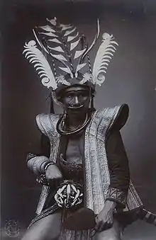 Studio portrait of a man dressed as a warrior.