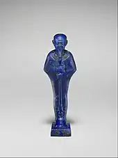 Ancient Egyptian cult image of Ptah; 945–600&nbsp;BC; lapis lazuli; height of the figure: 5.2&nbsp;cm, height of the dais: 0.4&nbsp;cm; Metropolitan Museum of Art