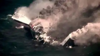 The hull breaks apart and sinks.