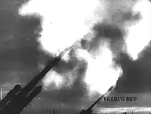 14:24 Anti-aircraft guns fire at night