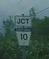 A township road marker of the typical trapezoidal shape in South Frontenac Township, Frontenac County, Ontario. This marker is of South Frontenac Township Road 10.