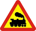 Railway crossing without gate or barrier
