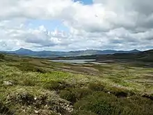View towards Loch Hoil Looking down from the track towards Loch Hoil, with Schiehallion on the skyline to the left.