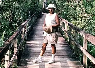 Woman on boardwalk in Everglades swamp
