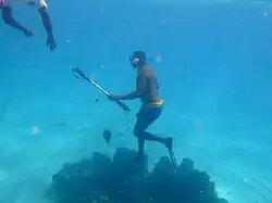 Two spear fishermen from the pirogue.