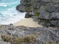 Drive along Maloney Drive Christchurch almost to the end of the road. Take the off-road track to the north past a farm and after about a kilometre you will see the beach north east of Long Beach from above.