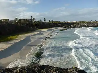 By January 2014 sand movement had again exposed the troublesome rocks in Cave Bay.