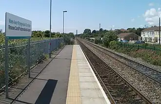 An empty platform and tracks into the distance: Rhoose Cardiff International Airport