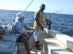Colonel Sid is into a decent Wahoo (known locally as King Fish) on the boat Billfisher II.